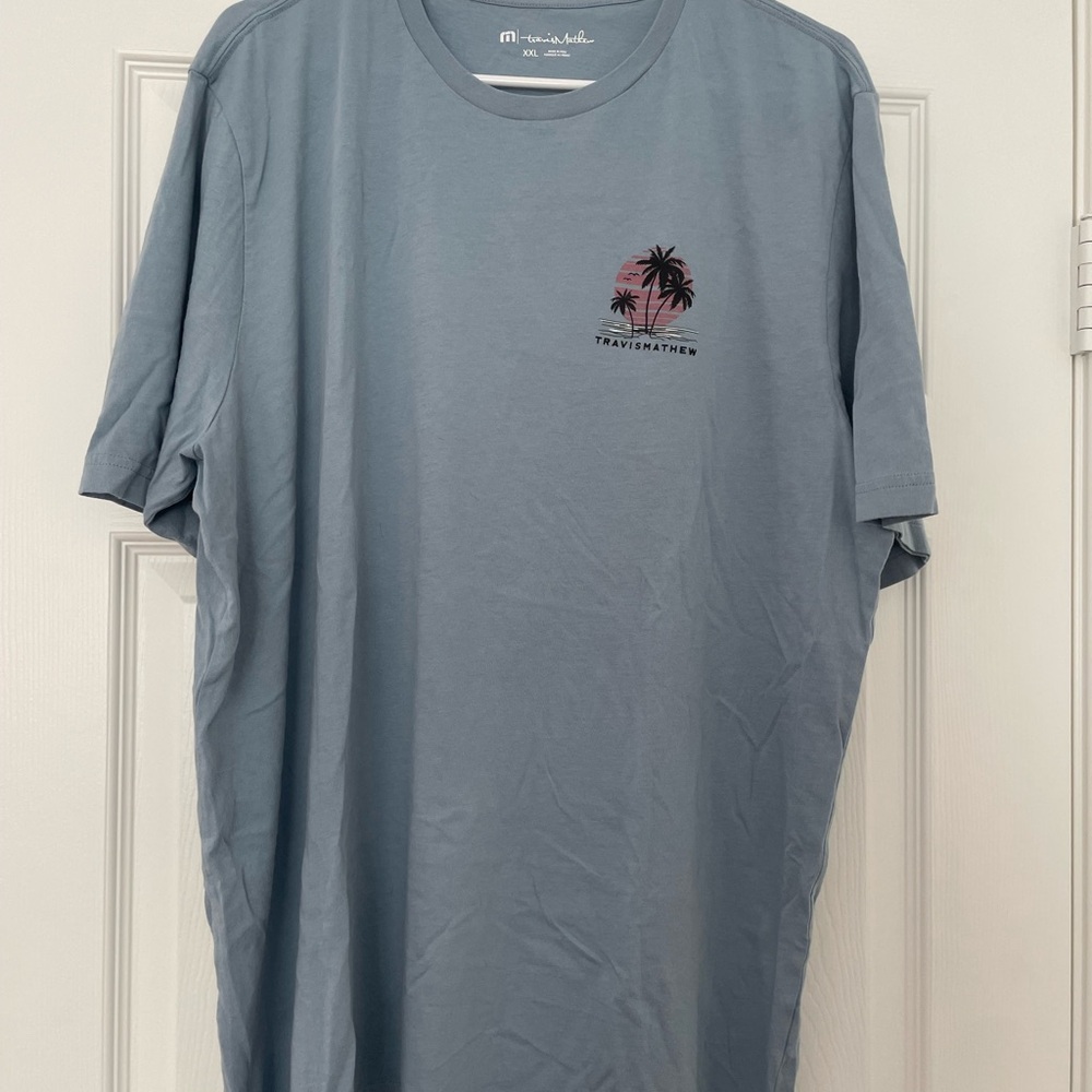 light blue men's top, gently used, brand travis mathew, size XXL